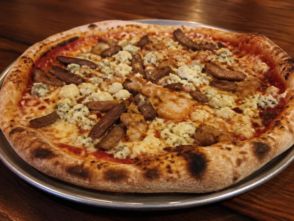 Hietalahti Special – Tomaattikastike, mozzarella, kebab, kana, fetajuusto, aurajuusto.